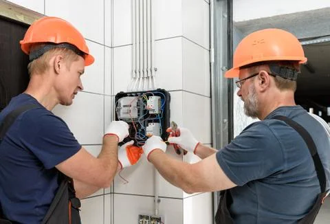 Electrical work indoors. Stock Photos