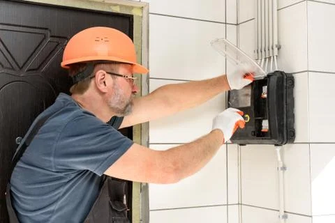 Electrical work indoors. Stock Photos