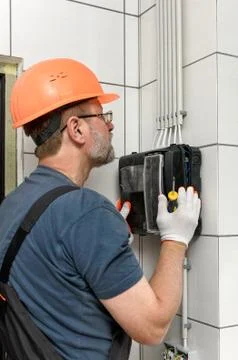 Electrical work indoors. Stock Photos