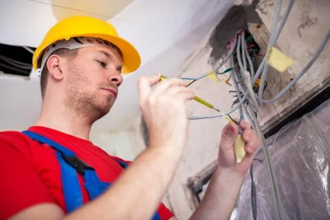 Electrical work under control of a skilled technician Stock-Fotos