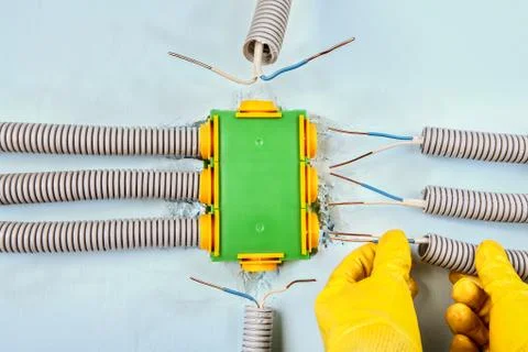 Electrical work, wiring installation services. Stock Photos