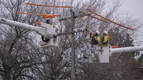 Electrical Workers On Lines Medium Shot Stock Footage 121339940