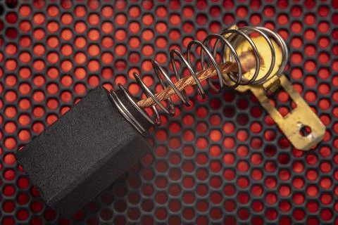 Electrically conductive graphite brush of a motor Stock Photos