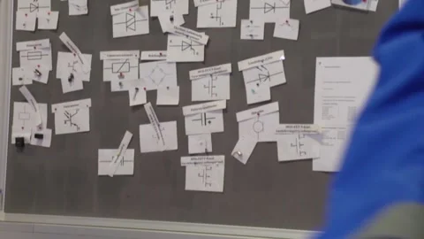 Electrician apprentice working with patch bay and different tools Stock Footage 237316051