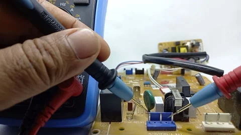 An electrician is checking the connection 스톡 동영상 157148685