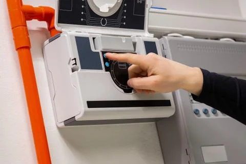 Electrician Checking Smoke Sensor at Fire Pannel In Datacenter Stock Photos