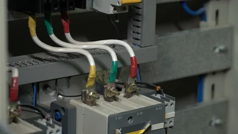 Electrician checks multi-colored wires Stock Footage 122244418
