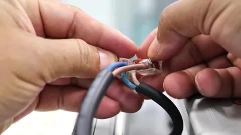 Electrician Connecting Wires Using Quick Connector 動画素材 297919540