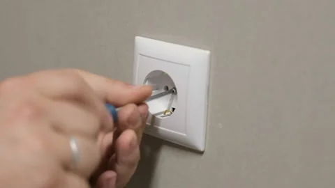 Electrician connects the sockets to the electrical wires. Stock Footage