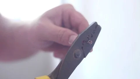 Electrician cutting electrical  cables with plier slow motion Stock Footage 80788897