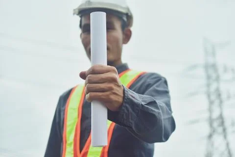 Electrician engineer High voltage post or high voltage tower background Stock Photos