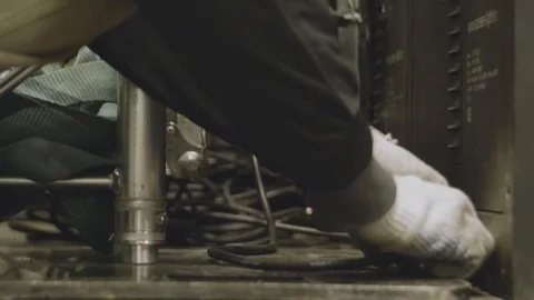 Electrician engineer tests electrical installations and wires on relay Stock Footage 85867977