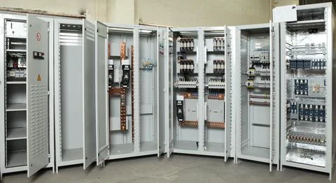 Electrician engineer work tester measuring voltage and current of power elect Stock Photos