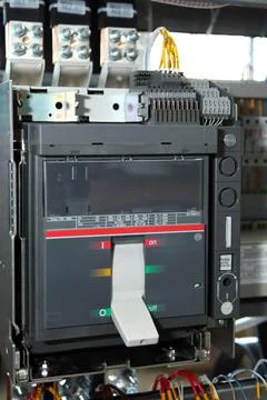 Electrician engineer work tester measuring voltage and current of power elect Stock Photos