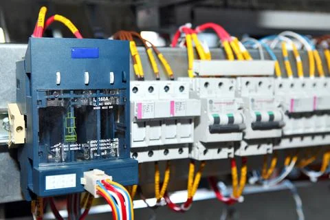 Electrician engineer work tester measuring voltage and current of power elect Foto stock