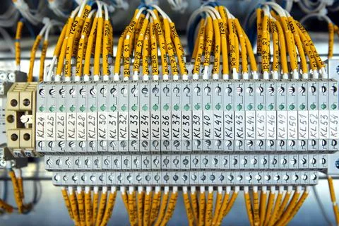 Electrician engineer work tester measuring voltage and current of power elect Stock Photos