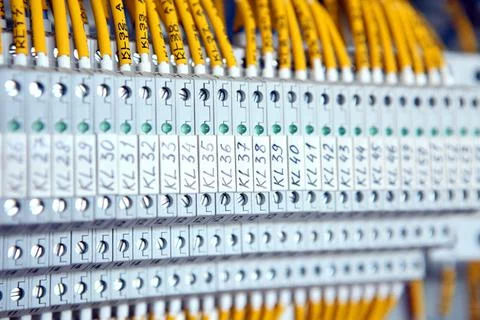 Electrician engineer work tester measuring voltage and current of power elect Stock Photos