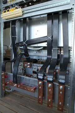 Electrician engineer work tester measuring voltage and current of power elect Stock Photos