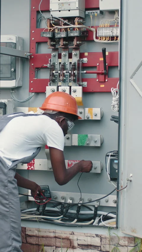 Electrician Inspecting Electrical Panel Stock Footage 318162112