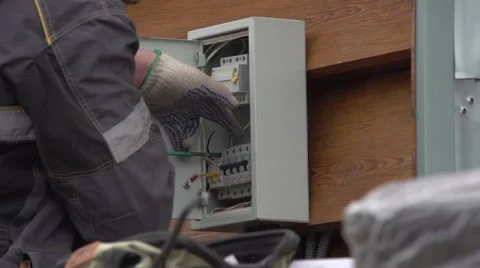 Electrician install electrical network in the house Stock Footage 61495468