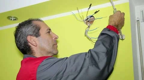 Electrician Installing an Electrical Supply System Stock Footage 12510734