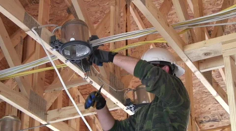 Electrician installing a light. 库存影片 842375