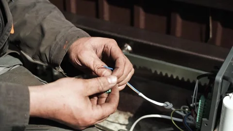 Electrician installs wiring using Connectors for connecting wires Stock Footage 274530360