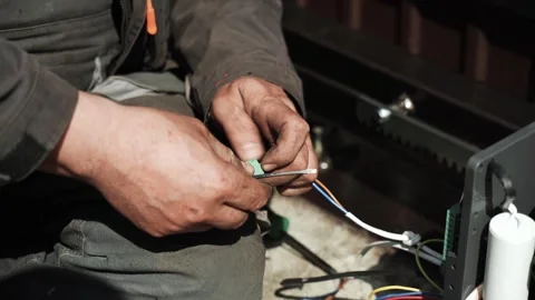 Electrician installs wiring using Connectors for connecting wires Stock Footage 274530381