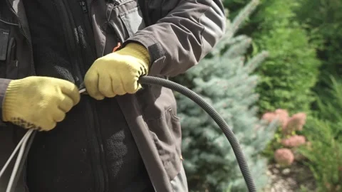 Electrician isolates the electrical wire with protective tape Stock Footage 261178141