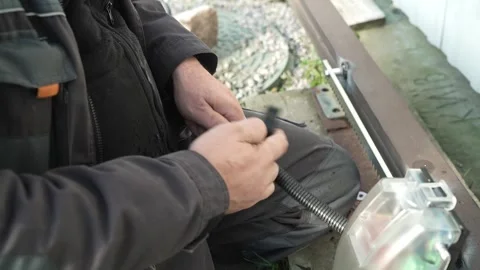 Electrician isolates the electrical wire with protective tape Stock Footage 261178322