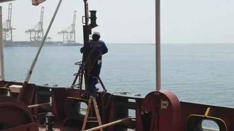Electrician Maintenance on Navigational Light Stock Footage 222284224