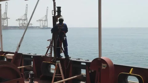 Electrician Maintenance on Navigational Light Stock Footage 222284526