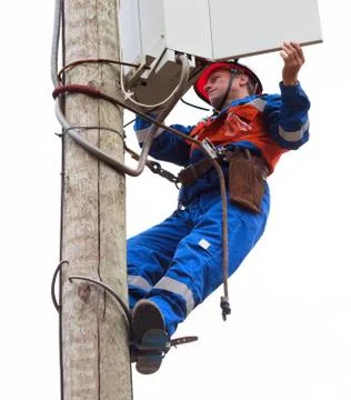 Electrician opened the control panel on the pole reclosers Stock Photos