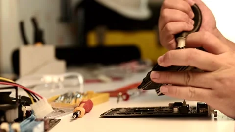 The electrician or engineering maintenance and fix computer hardware. Stock Footage 154437223