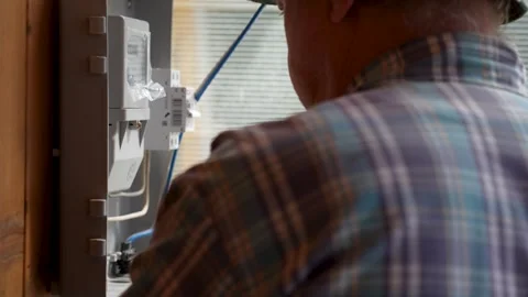 Electrician or Worker Installing Electrical Panel Stock Footage 313182271