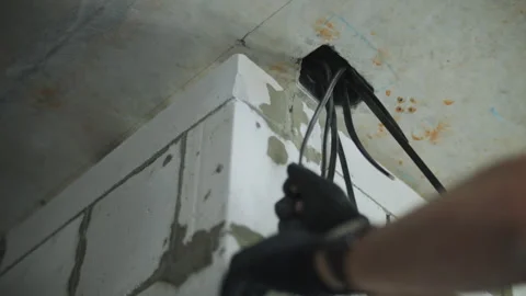 Electrician Pulling Wire In Wall Stock Footage 292419484