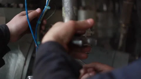Electrician puts the wires in a box Video stock 48375995