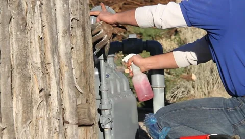 Electrician Spraying Stock Footage 1003311