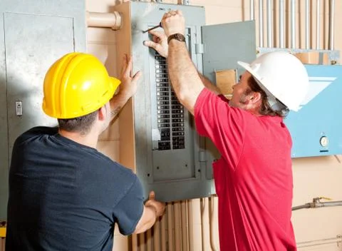 Electrician Teamwork Stock Photos
