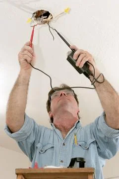 Electrician Testing Voltage Stock Photos