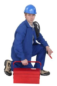 Electrician with a tool box Stock Photos