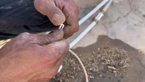 Electrician Using Pliers to Cut and Strip Electrical Wire 스톡 동영상 345740892