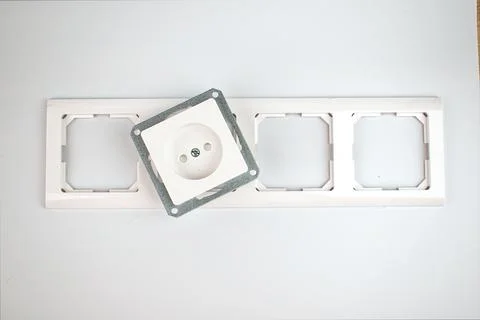 Electrician. White socket and socket cover. Renovation concept. Copy space. F Stock Photos