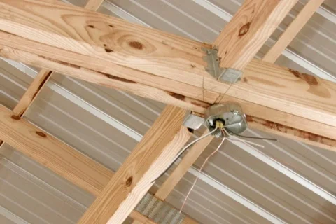 Electrician wiring a new ceiling outlet box Stock Footage