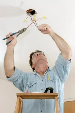 Electrician At Work Stock Photos