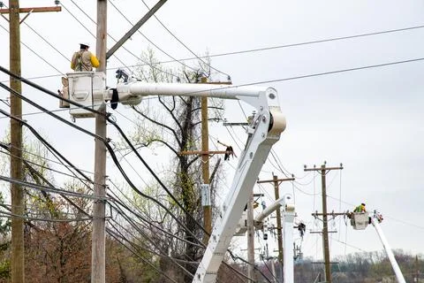 Electrician worker work on fixing and changing by being in crane electricia.. Stock Photos
