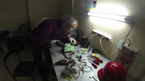 Electrician Working on the Night Shift Stock Footage 32169197