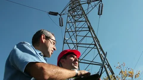 Electricians Under the High Voltage Tower Stock Footage 12366403