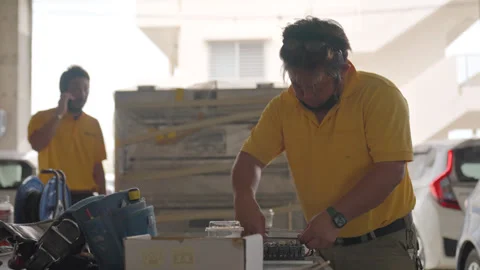Electricians at Work in the Yard Stock-Footage 332515346