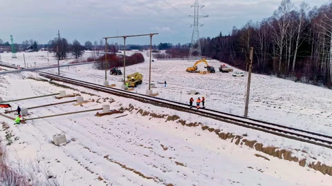 Electricians working on utility pole and transmission towers in the winter Stock Footage 221413607